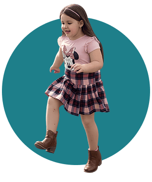 Girl in a pink shirt skipping