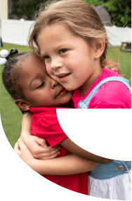 Two kids hugging
