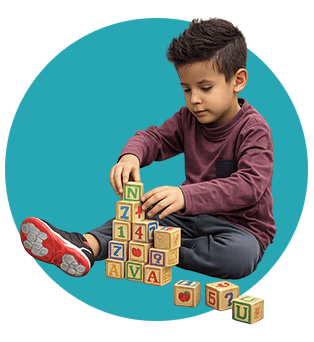 boy playing with blocks