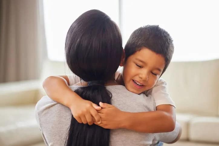 mother and child hugging